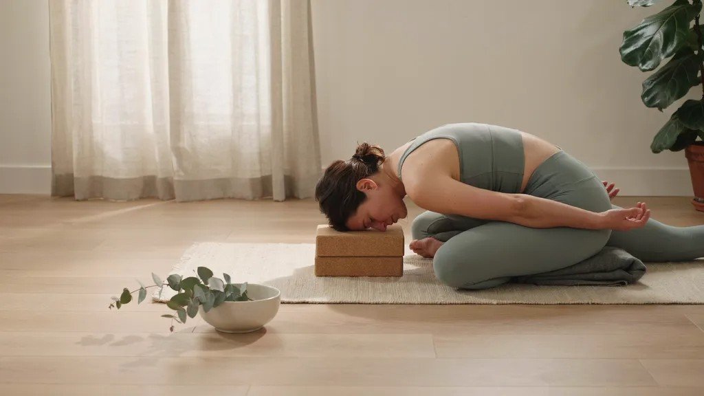 Sleeping Swan Pose with forward fold and support.