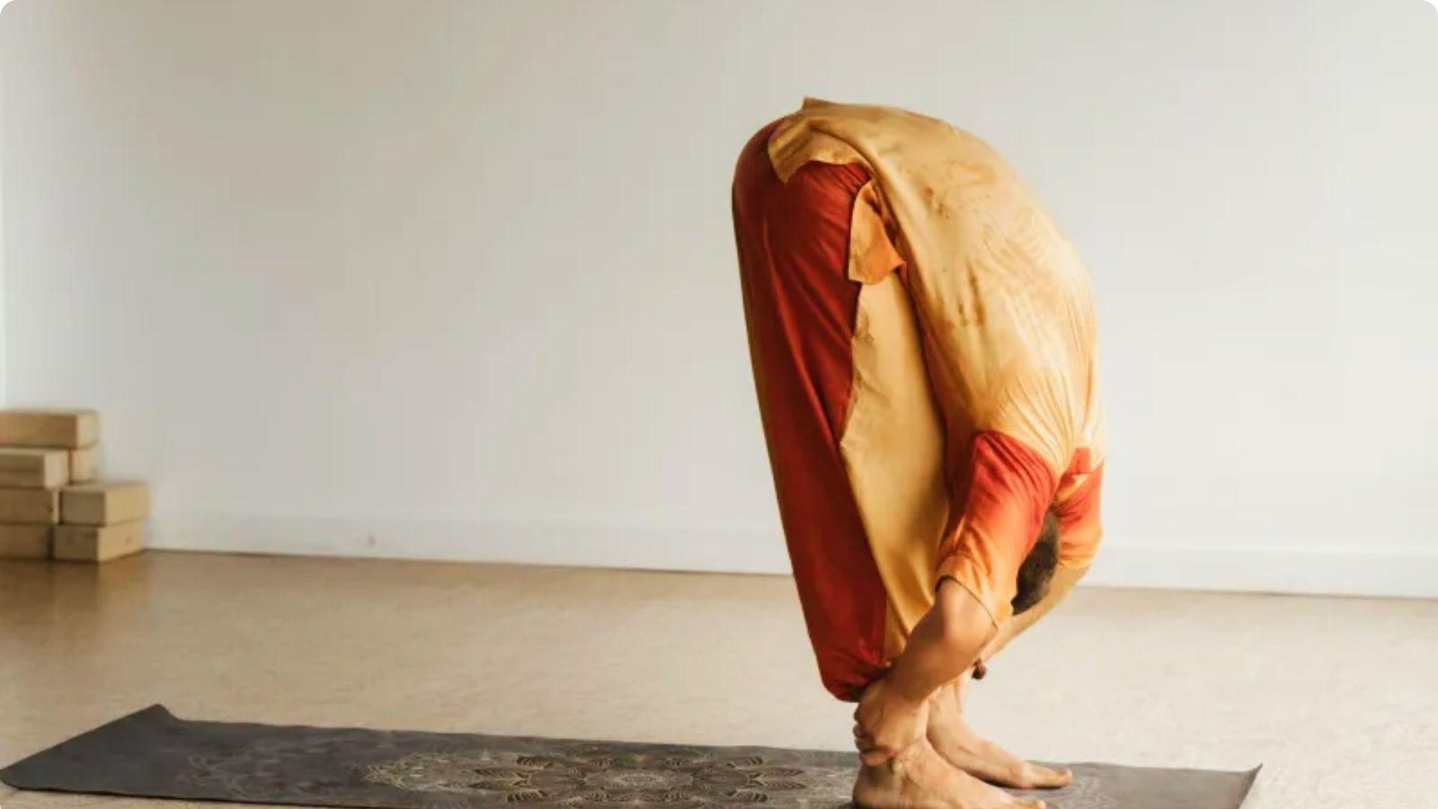 Standing Forward Bend (Padahastasana) is one of the Beneficial Hatha Yoga Poses