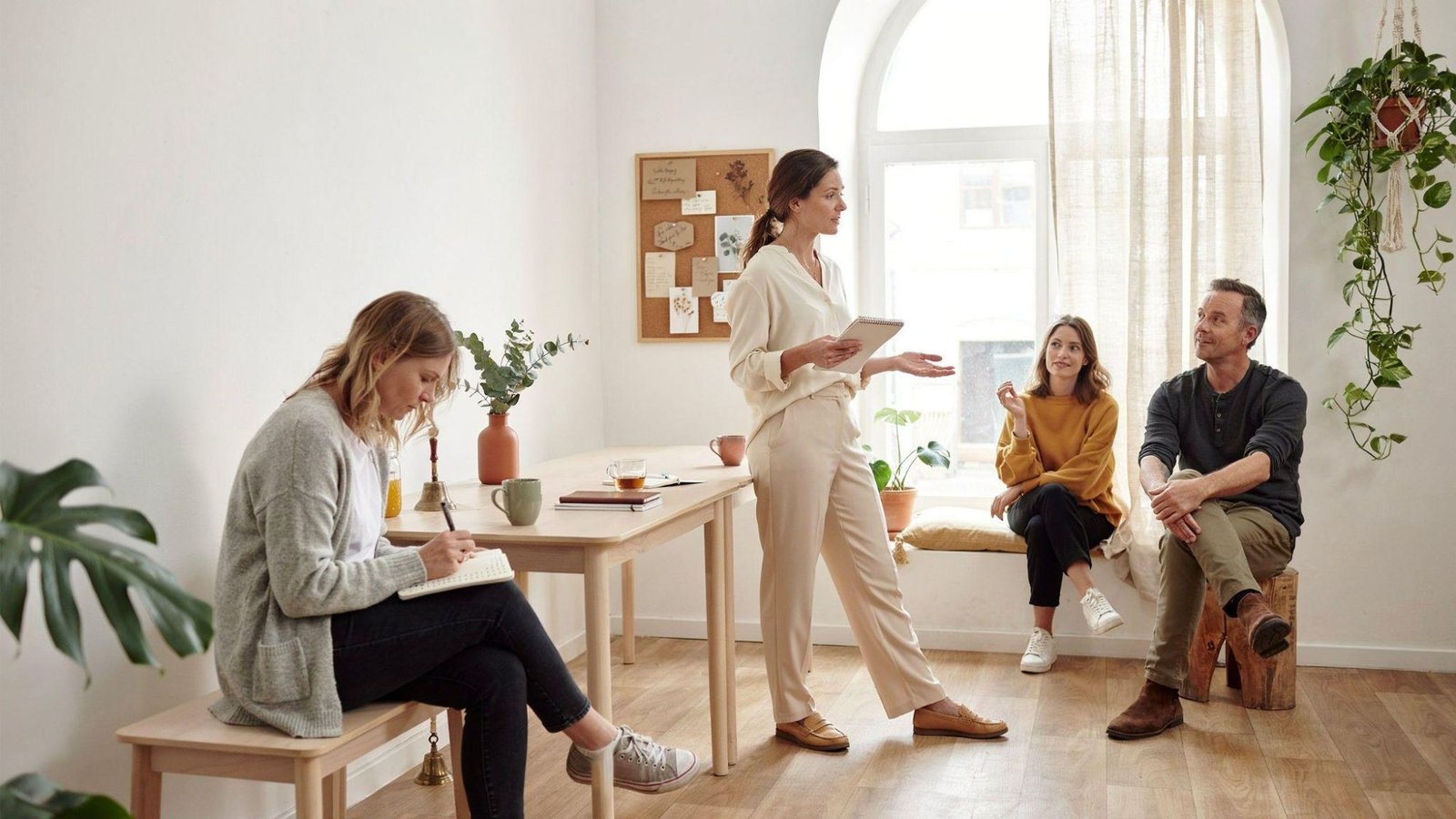 Adults attending a wellness workshop for learning and self-improvement.