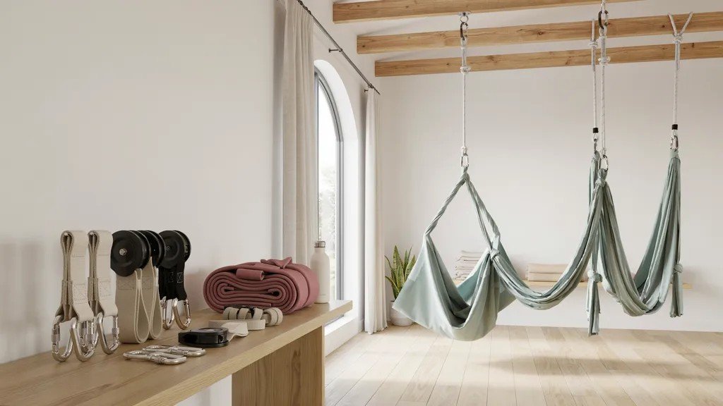 Different types of aerial yoga equipment used in studios.